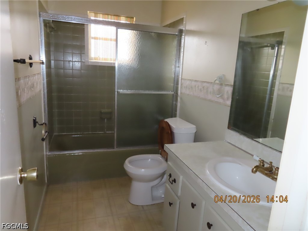 6025 Pine Lane Sebring, FL 33876 - Photo 6 of 12 a bathroom with a sink toilet and shower
