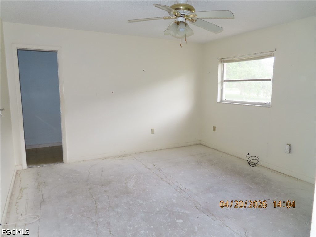 6025 Pine Lane Sebring, FL 33876 - Photo 7 of 12 an empty room with a window