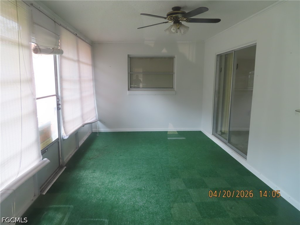 6025 Pine Lane Sebring, FL 33876 - Photo 10 of 12 a view of room with window and a ceiling fan