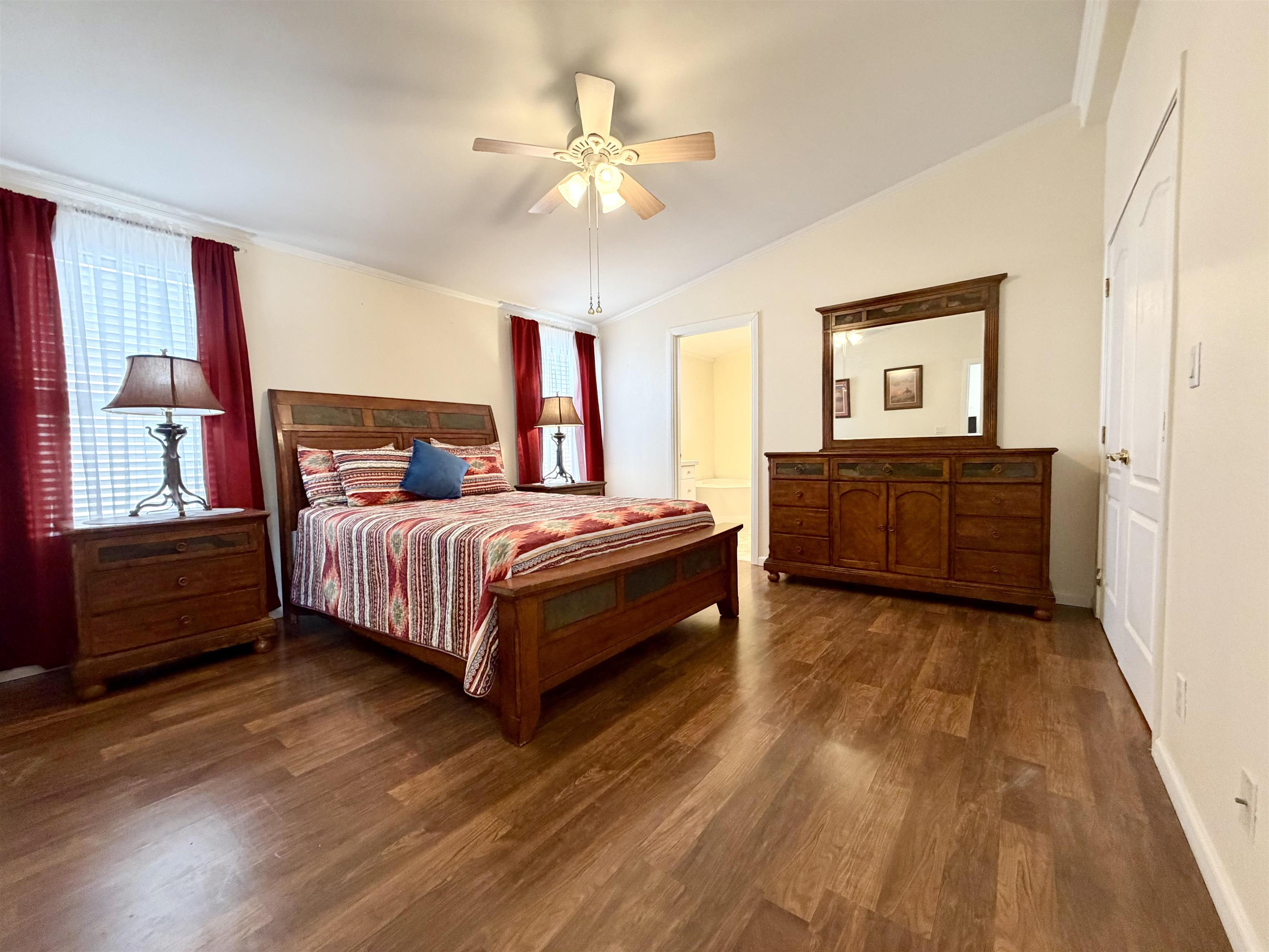 435 32 Road, Unit 480 Clifton, CO 81520 - Photo 12 of 23 a bedroom with a bed and window