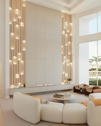 a living room with couches and kitchen view with wooden floor