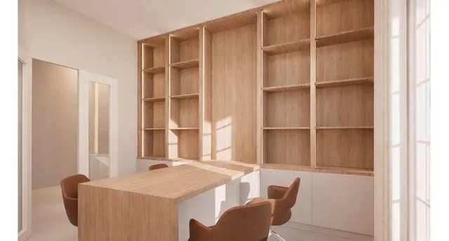 a dining room with furniture and a window