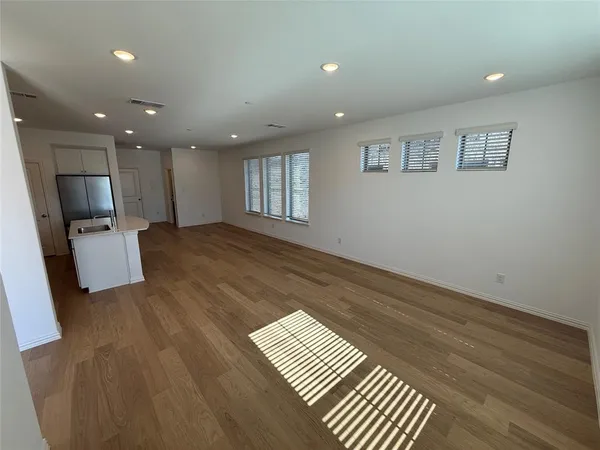 a view of kitchen with cabinets