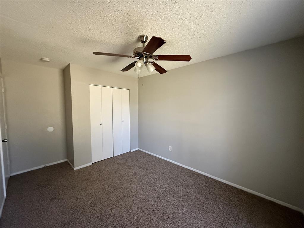 375 Ancestry Lane Dallas, TX 75217 - Photo 13 of 19 a view of a small space with a fan