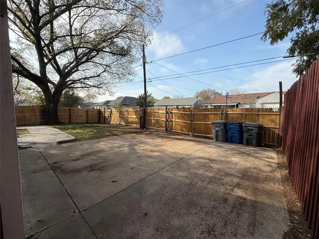 a view of a terrace with trees