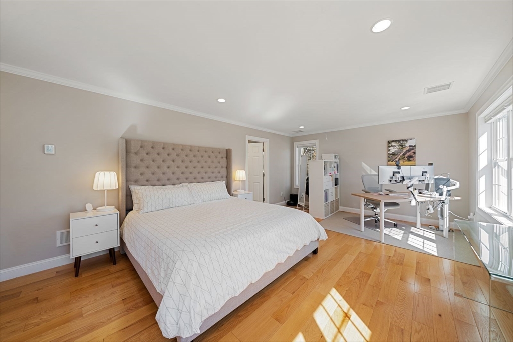 7 Hayes Road Hingham, MA 02043 - Photo 11 of 34 a bedroom with a bed and table chair