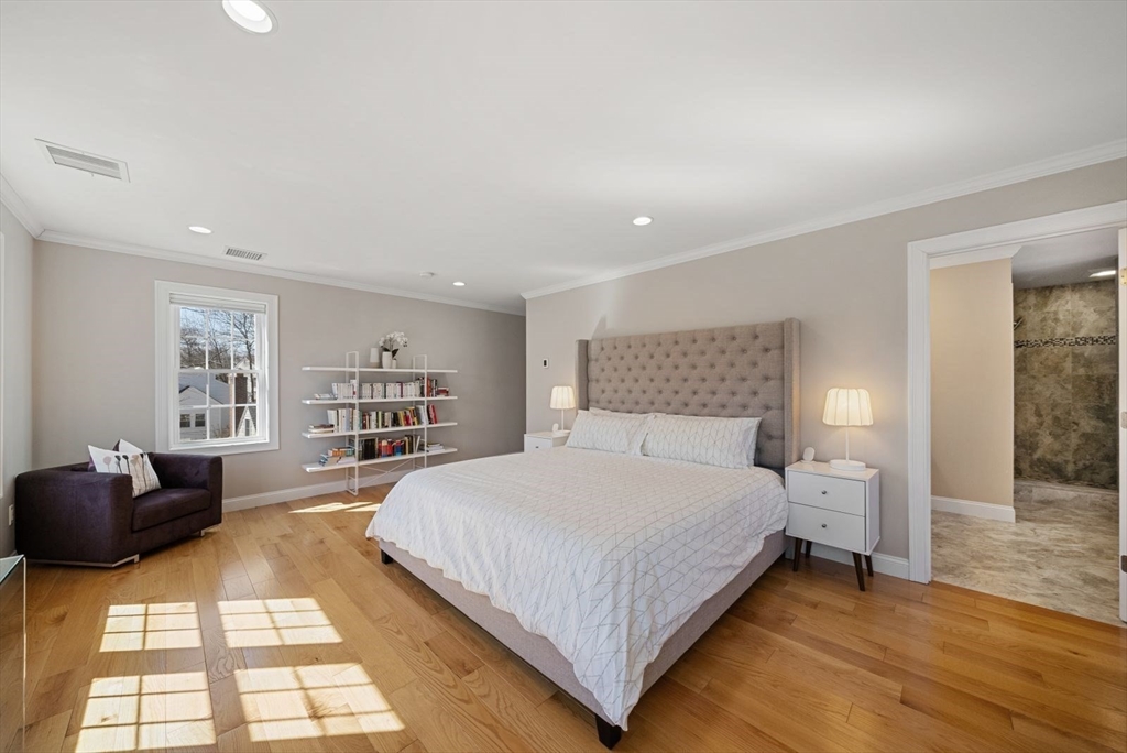 7 Hayes Road Hingham, MA 02043 - Photo 12 of 34 a bedroom with a large bed and a couch