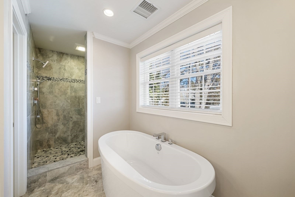 7 Hayes Road Hingham, MA 02043 - Photo 15 of 34 a bathroom with a bathtub and shower