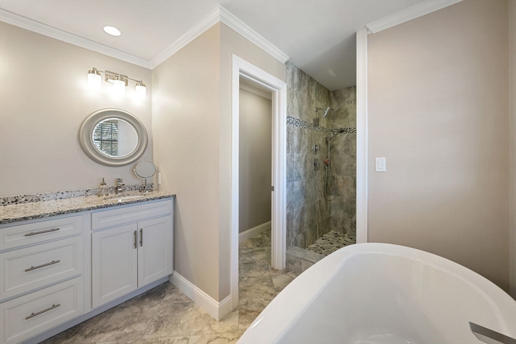 7 Hayes Road Hingham, MA 02043 - Photo 16 of 34 a bathroom with a granite countertop sink and a mirror