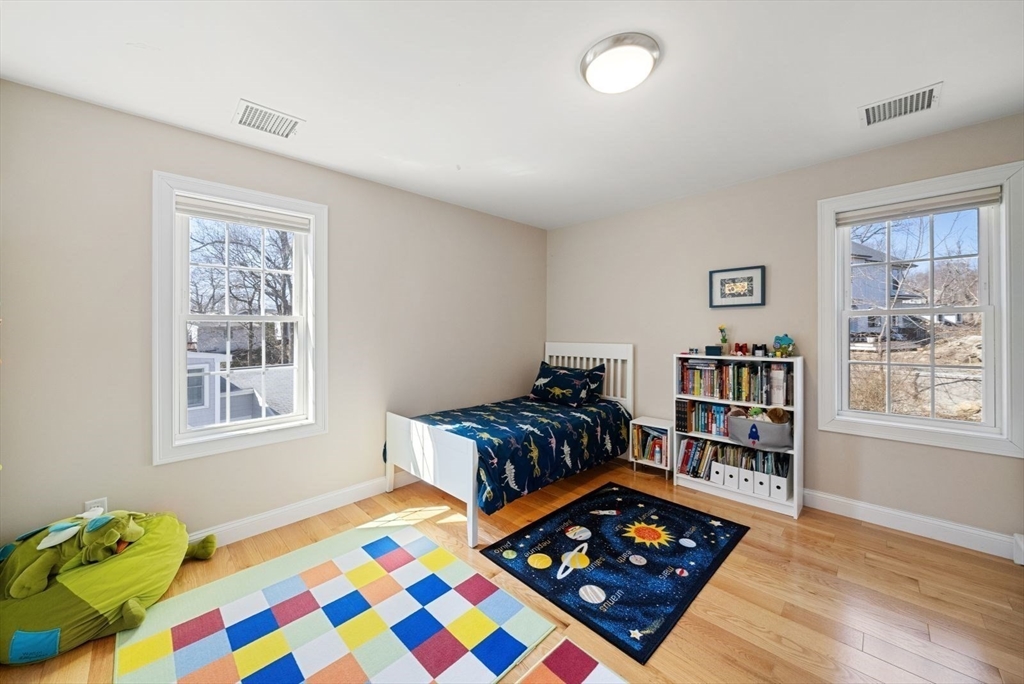 7 Hayes Road Hingham, MA 02043 - Photo 17 of 34 a bedroom with a bed and a window