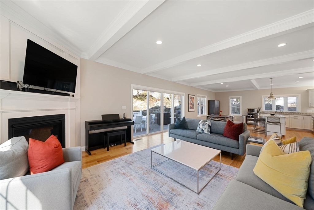 7 Hayes Road Hingham, MA 02043 - Photo 3 of 34 a living room with fireplace furniture and a flat screen tv