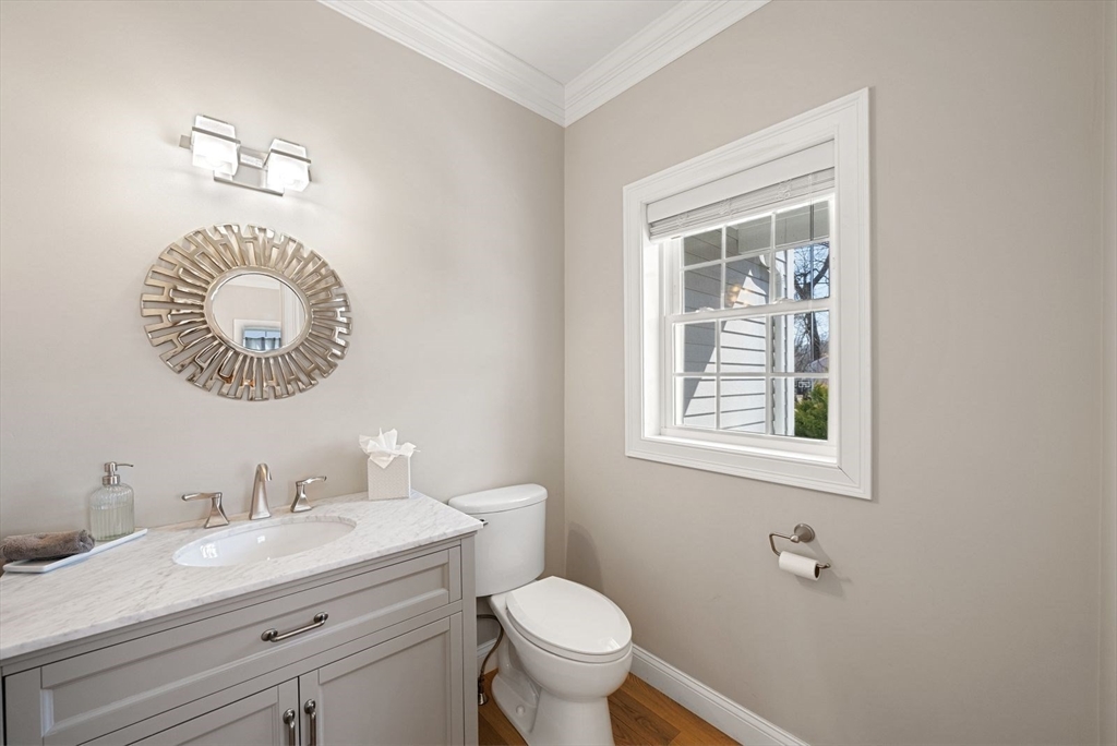 7 Hayes Road Hingham, MA 02043 - Photo 10 of 34 a bathroom with a toilet a sink and mirror