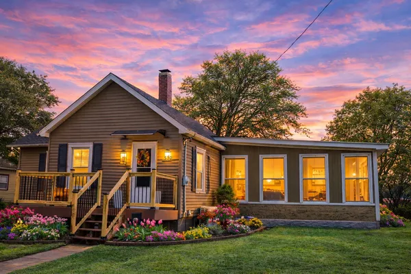 front view of a house with a yard