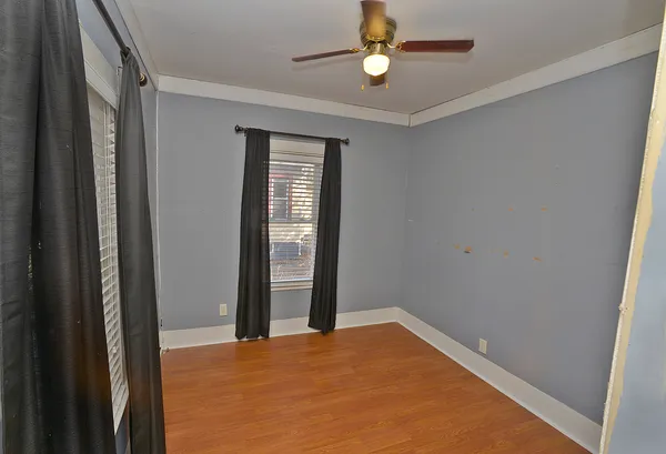 a view of an empty room and window