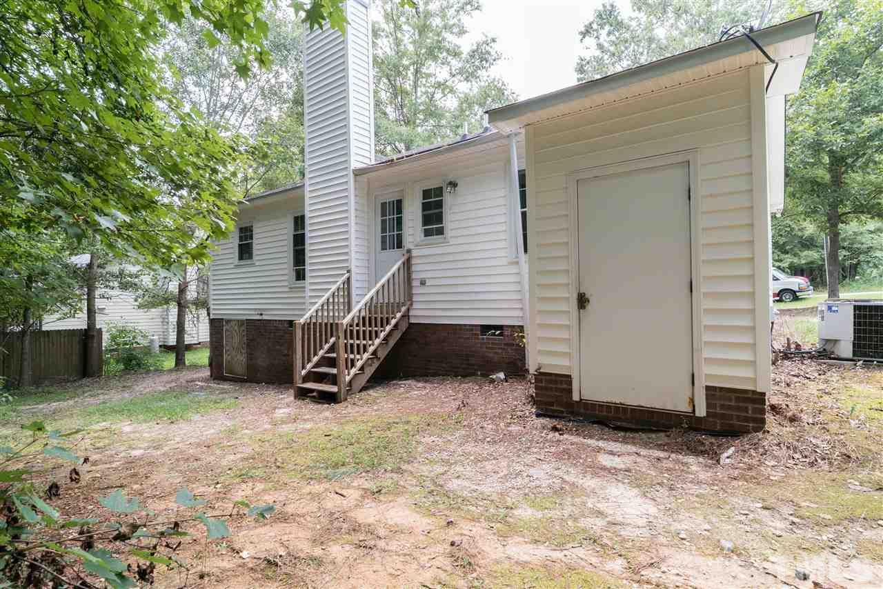 5960 Sandy Run Knightdale, NC 27545 - Photo 12 of 13 a view of a house with a yard