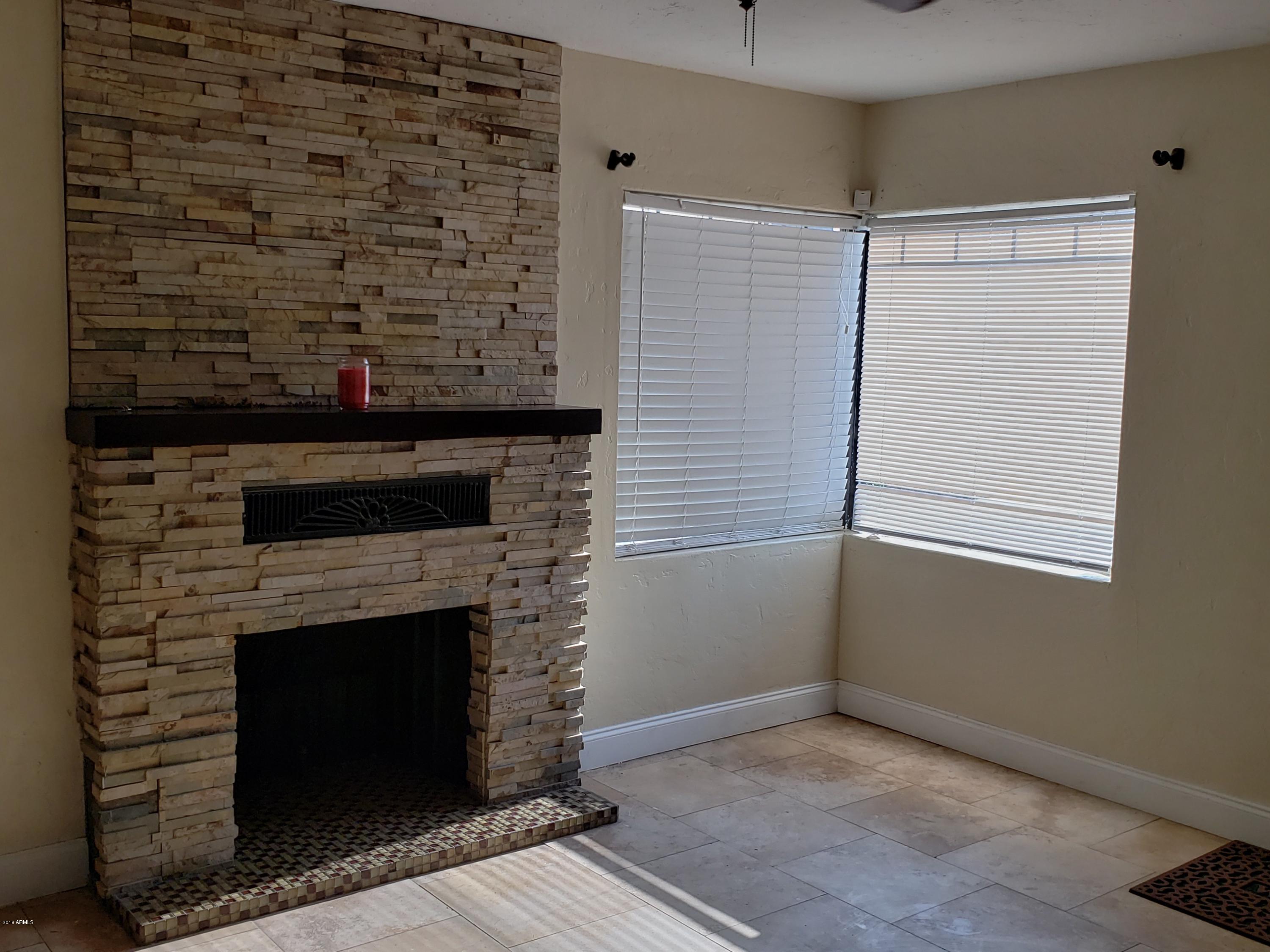 3202 North 37th Street Phoenix, AZ 85018 - Photo 8 of 20 Fireplace in living room