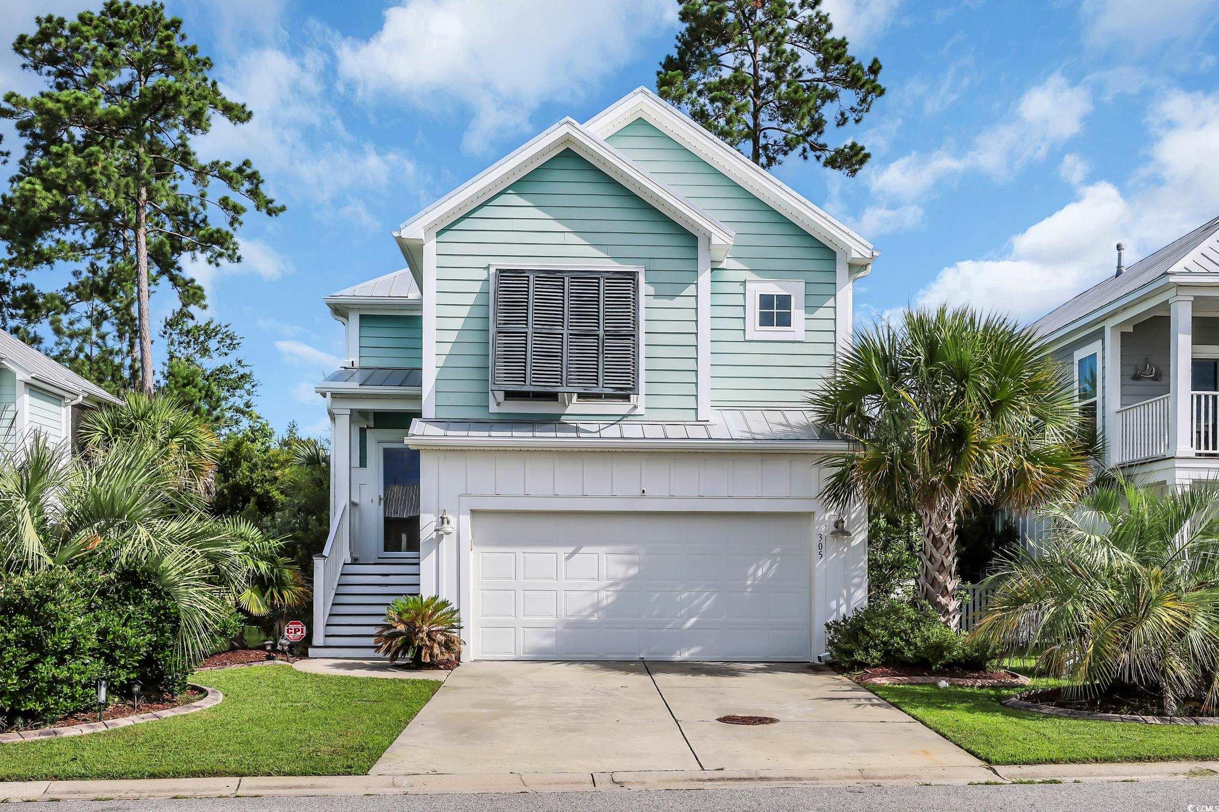 305 Splendor Circle Murrells Inlet, SC 29576 - Photo 1 of 36 View of front of home featuring a garage, driveway