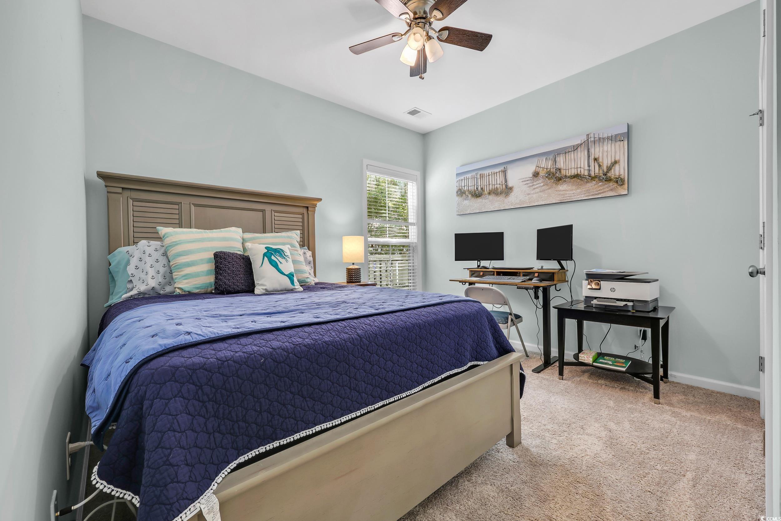 305 Splendor Circle Murrells Inlet, SC 29576 - Photo 28 of 36 Carpeted bedroom featuring baseboards and ceiling