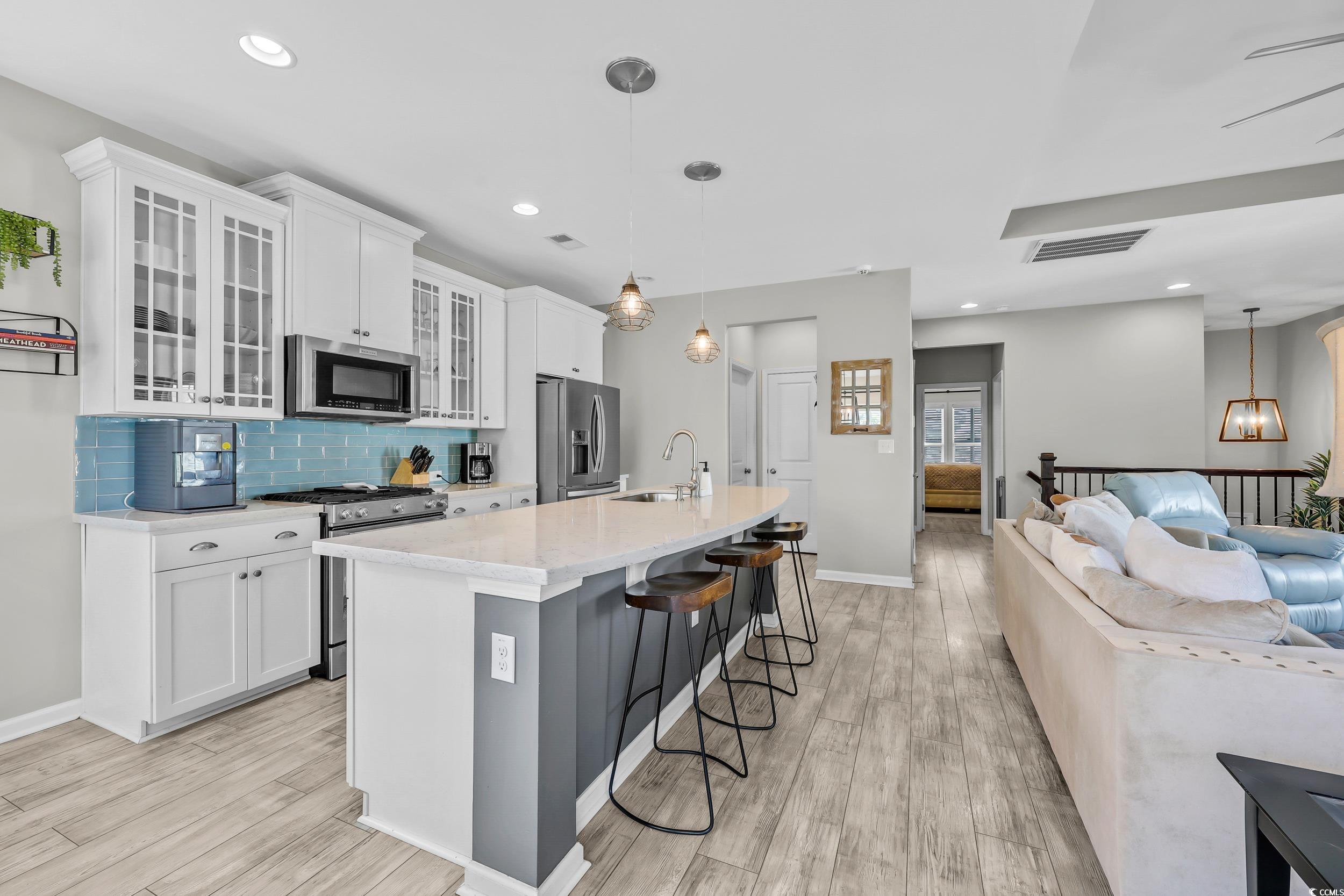 305 Splendor Circle Murrells Inlet, SC 29576 - Photo 9 of 36 Kitchen featuring stainless steel appliances, open