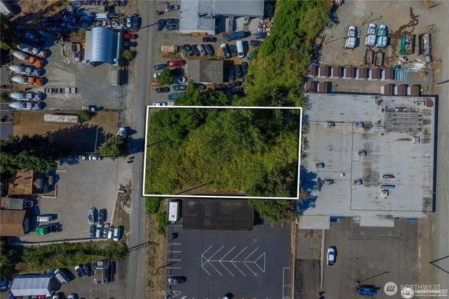 an aerial view of houses and roads