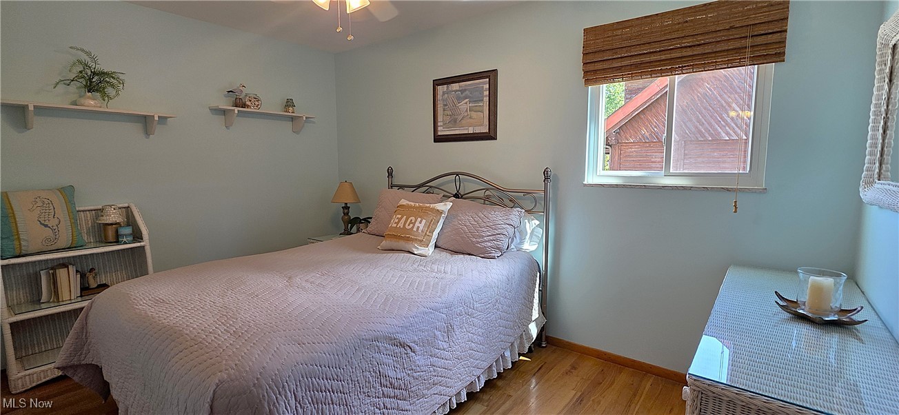 15485 Albion Road Strongsville, OH 44136 - Photo 22 of 36 2nd floor Bedroom with wood finished floors and a ceiling fan
