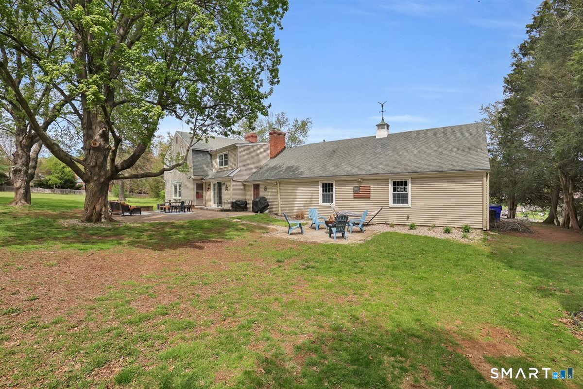 72 Old Post Road Wethersfield, CT 06109 - Photo 32 of 40 a front view of a house with yard porch and seating
