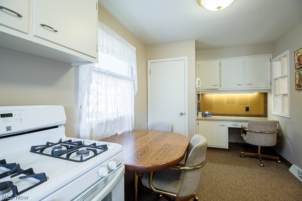 31654 Densmore Road Willowick, OH 44095 - Photo 8 of 25 The kitchen has a built in office space for daily organization