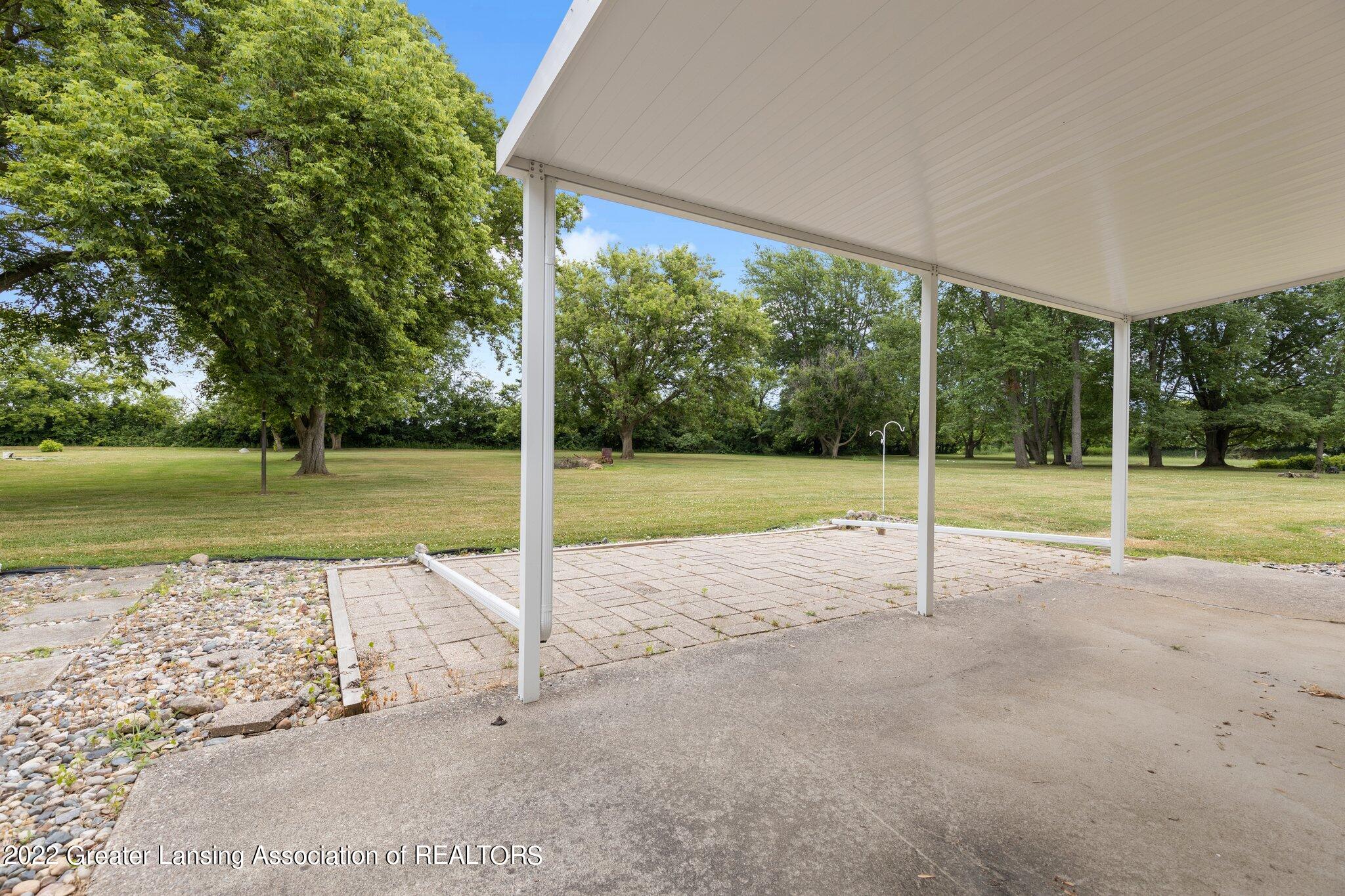 99 South Aurelius Road Mason, MI 48854 - Photo 23 of 32 99, awning