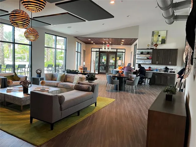 a living room with fireplace furniture and a flat screen tv