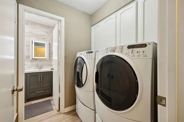 a utility room with dryer and washer