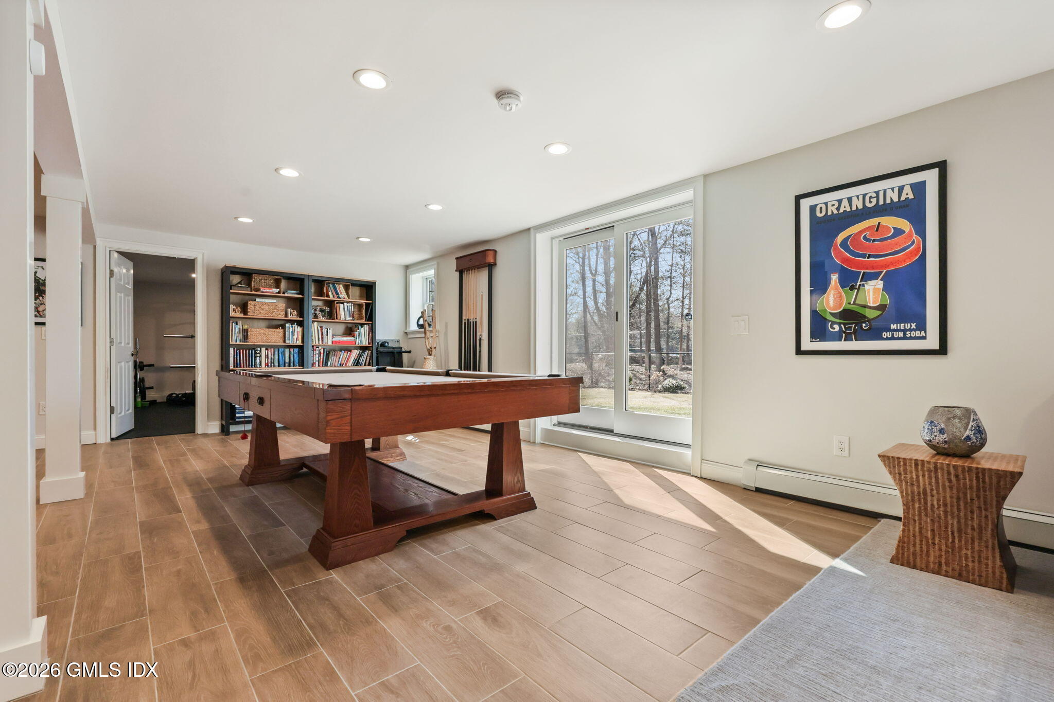 97 Davenport Ridge Lane Stamford, CT 06903 - Photo 25 of 31 a living room with furniture and a table