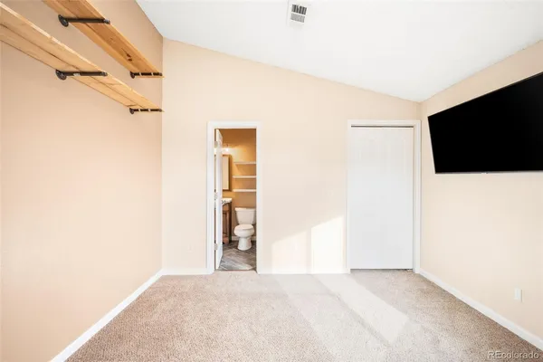 a view of a livingroom with wooden floor