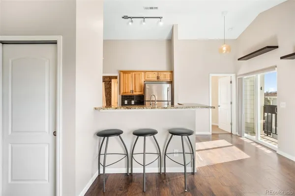 a room with table and chairs