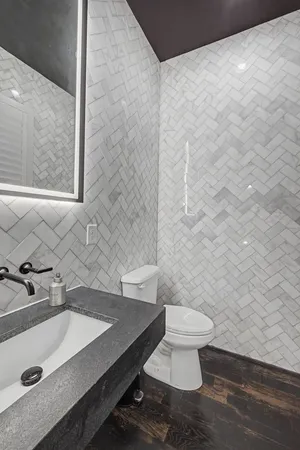 a bathroom with a sink and a toilet