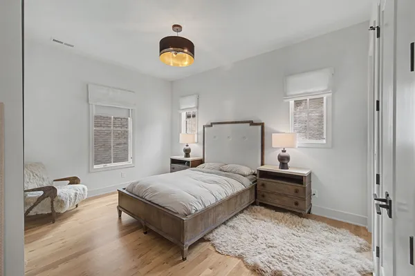 a bedroom with a bed and a cabinets