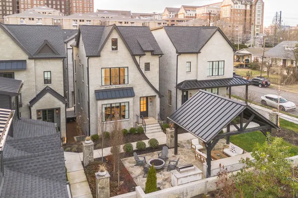 an aerial view of a house with a patio