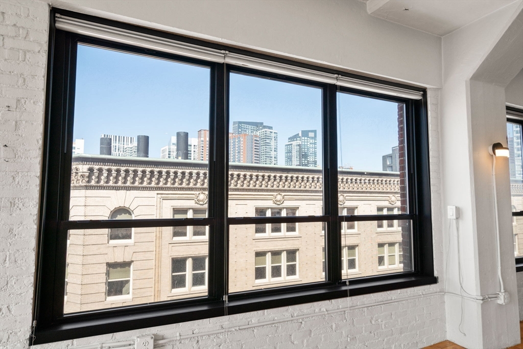 210 Lincoln Street, Unit 601 Boston, MA 02111 - Photo 15 of 29 a view of a building from a window