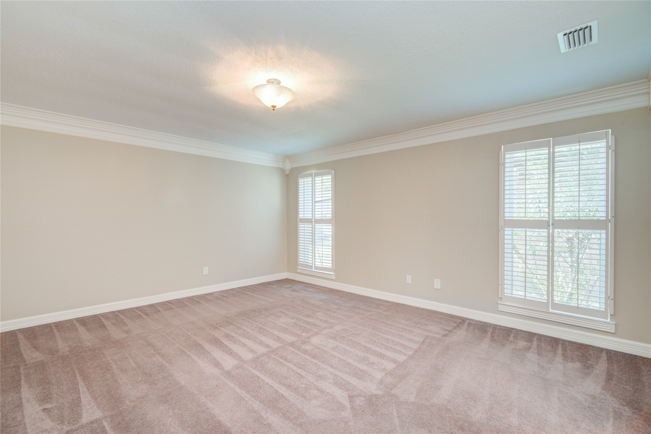 8906 Herts Road Spring, TX 77379 - Photo 22 of 43 a view of an empty room with a window