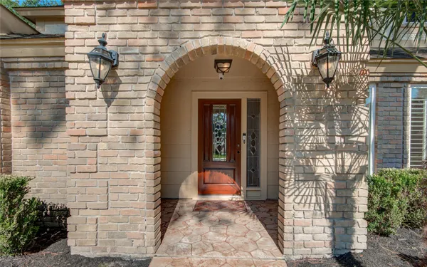 a front view of a house with a glass door