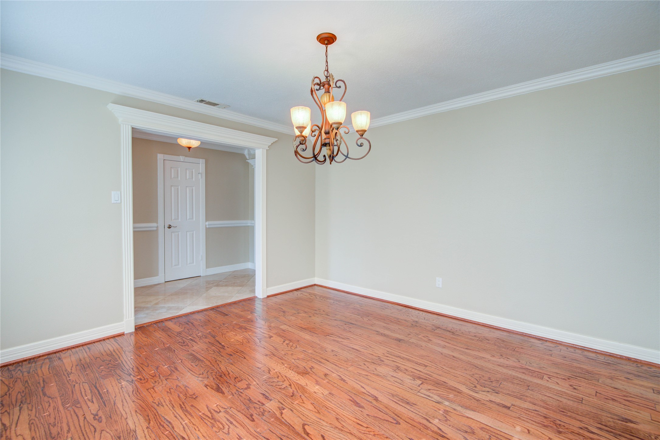8906 Herts Road Spring, TX 77379 - Photo 8 of 43 wooden floor in an empty room
