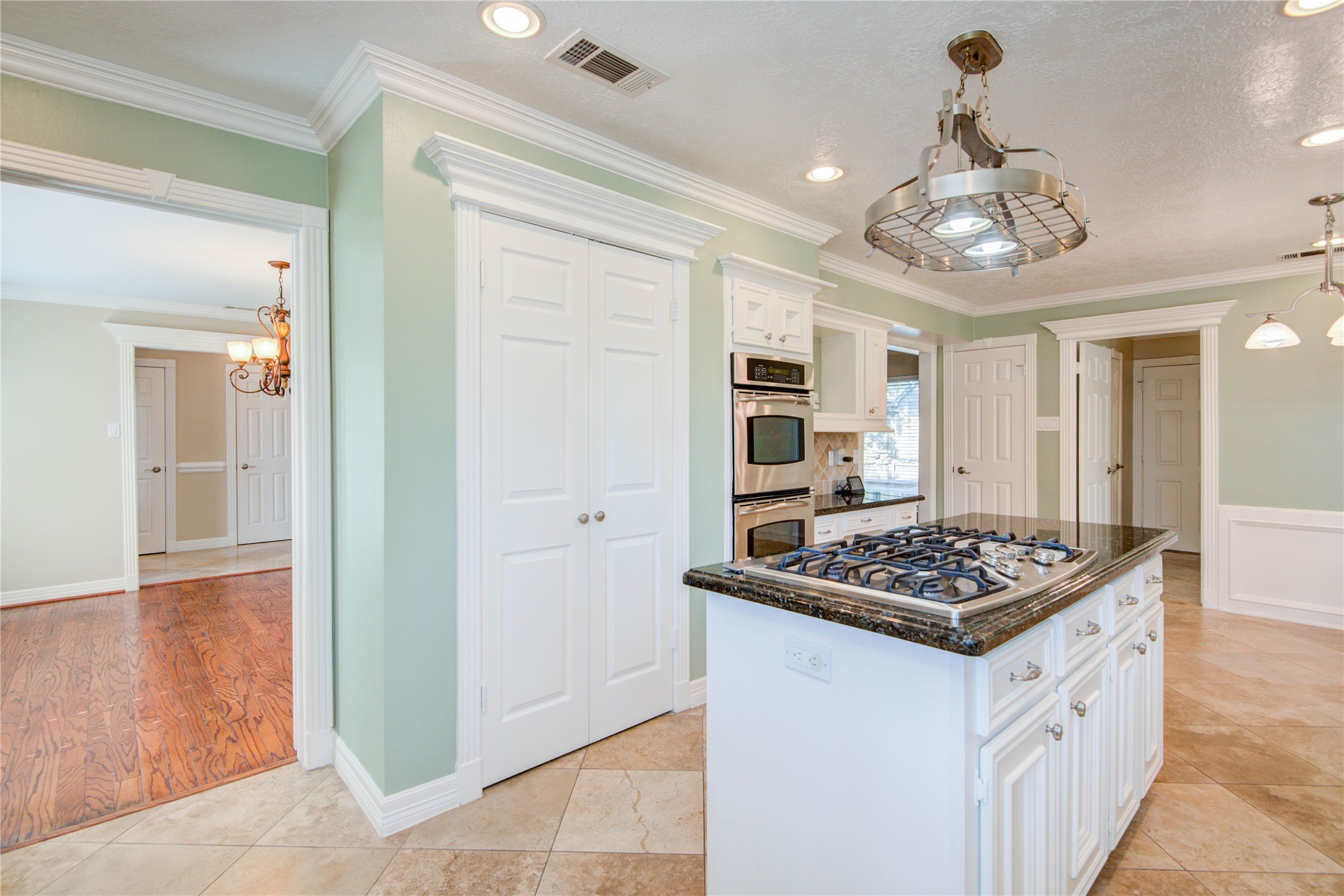 8906 Herts Road Spring, TX 77379 - Photo 10 of 43 a kitchen that has a lot of cabinets