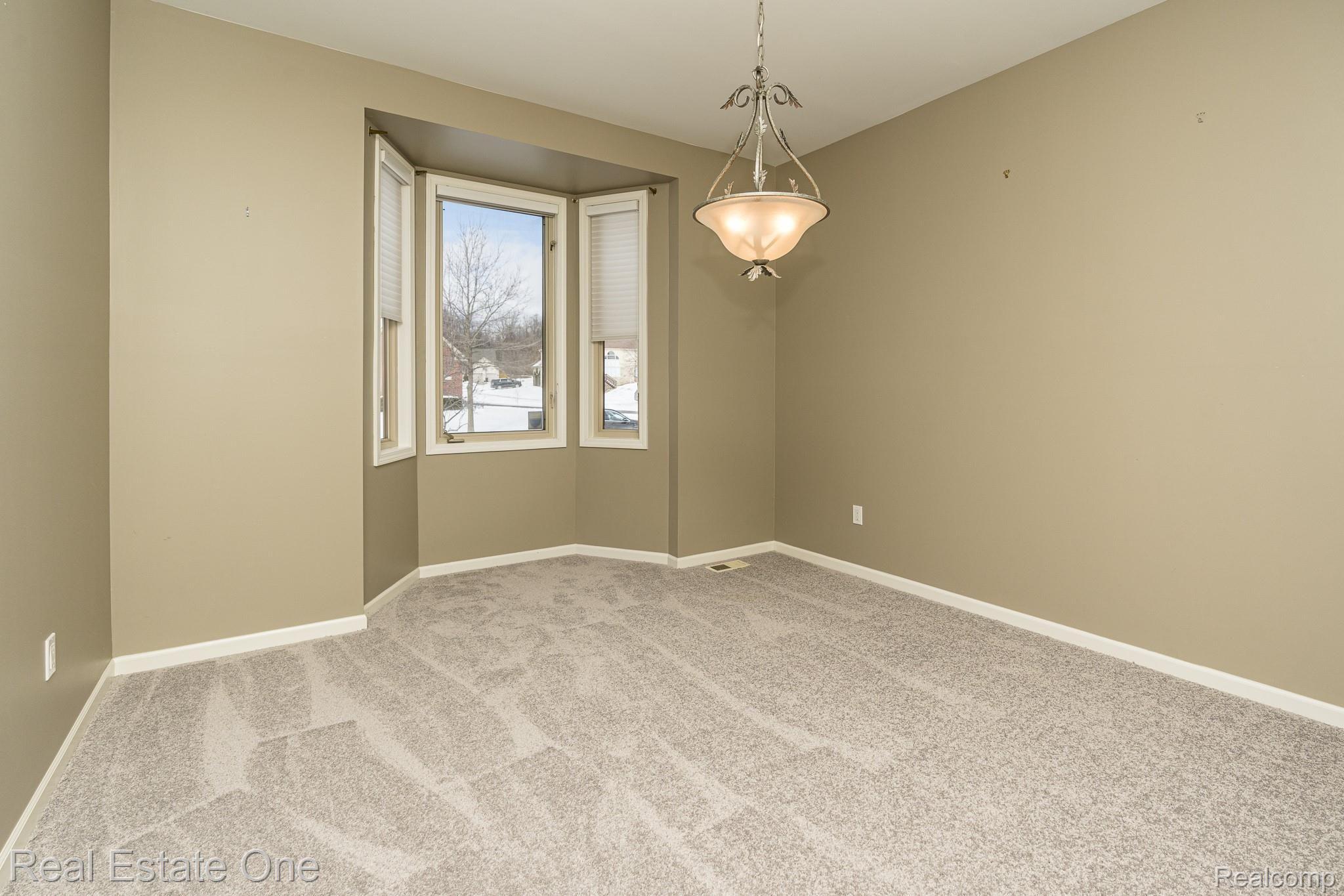 115 Scarborough Lane Rochester, MI 48306 - Photo 21 of 46 Formal dining room