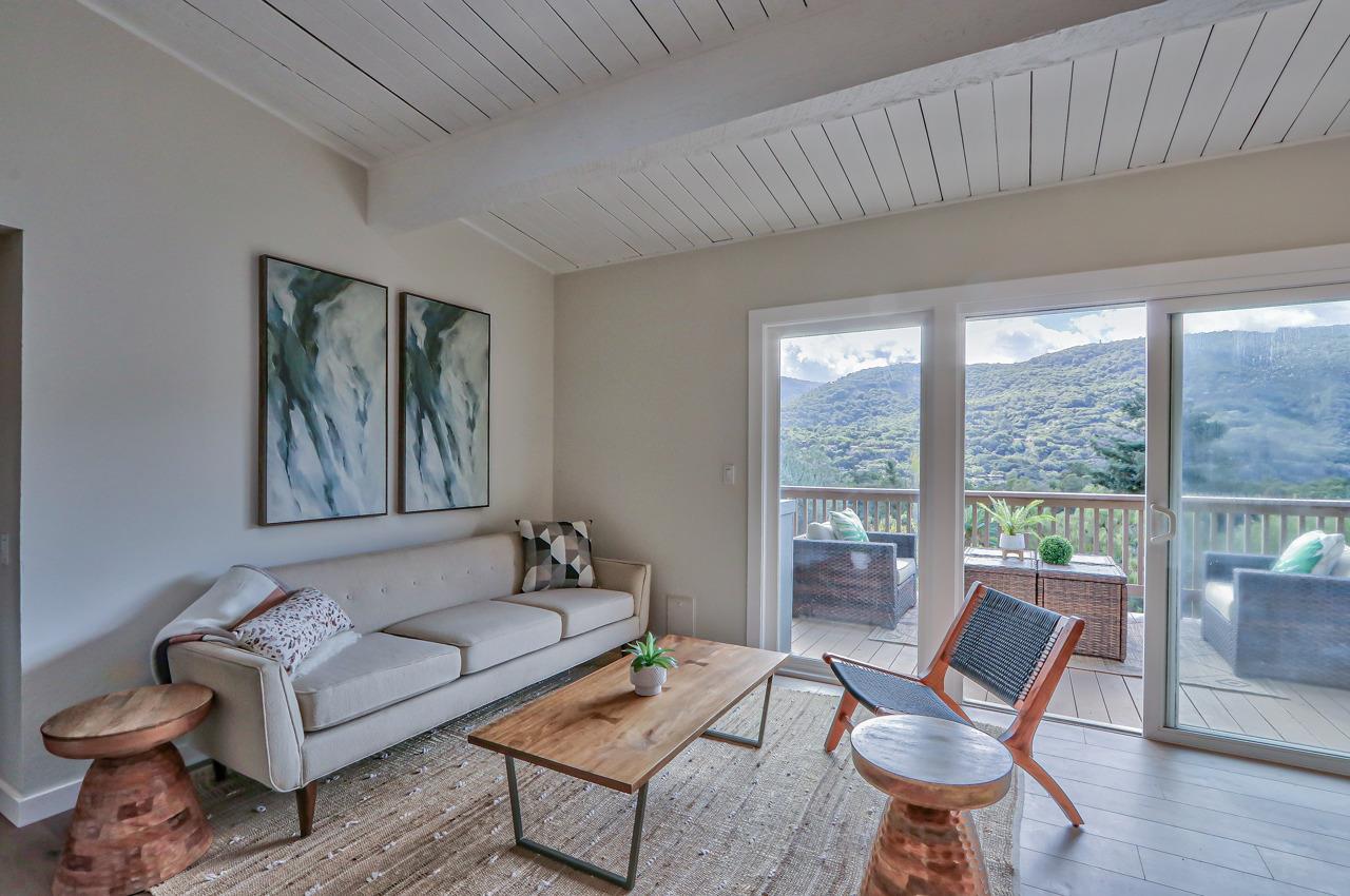 41 Poppy Road Carmel Valley, CA 93924 - Photo 12 of 35 a living room with furniture and a large window