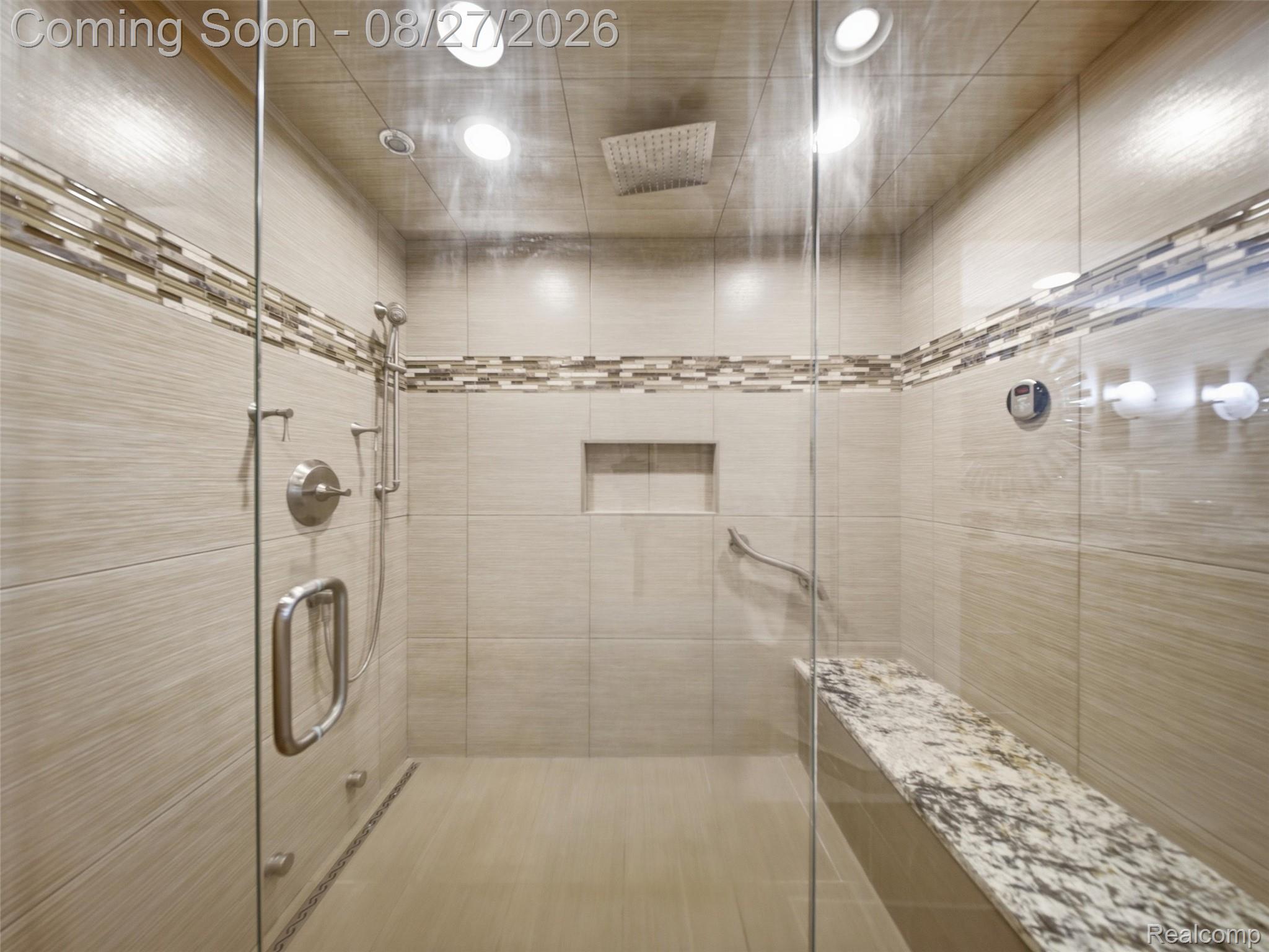 3549 Mann Road Clarkston, MI 48346 - Photo 38 of 63 Custom-Tiled Walk-In Shower with Built-In Bench, Multiple Shower Heads, & Steam Shower