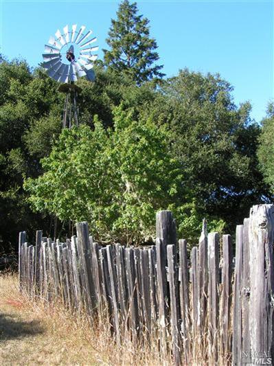 9 Drakes Summit Road Point Reyes Station, CA 94956 - Photo 3 of 5 a view of outdoor space with wooden fence