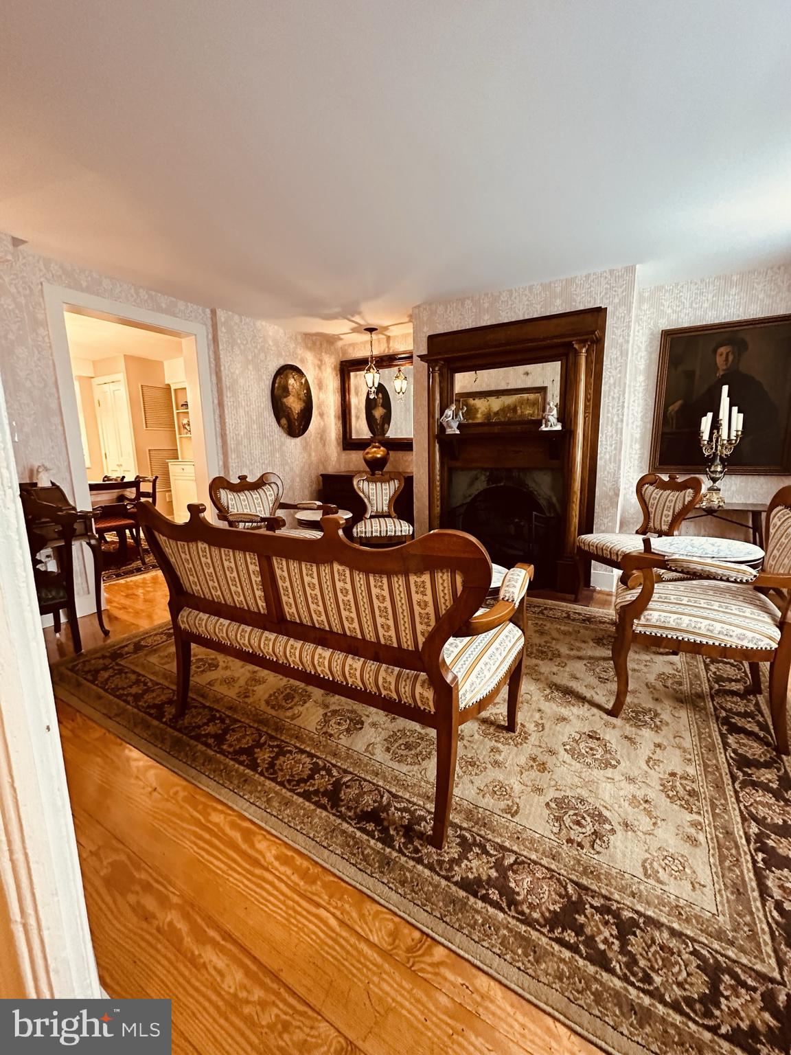 1627 Aliceanna Street Baltimore, MD 21231 - Photo 11 of 60 a living room with furniture and a wooden floor