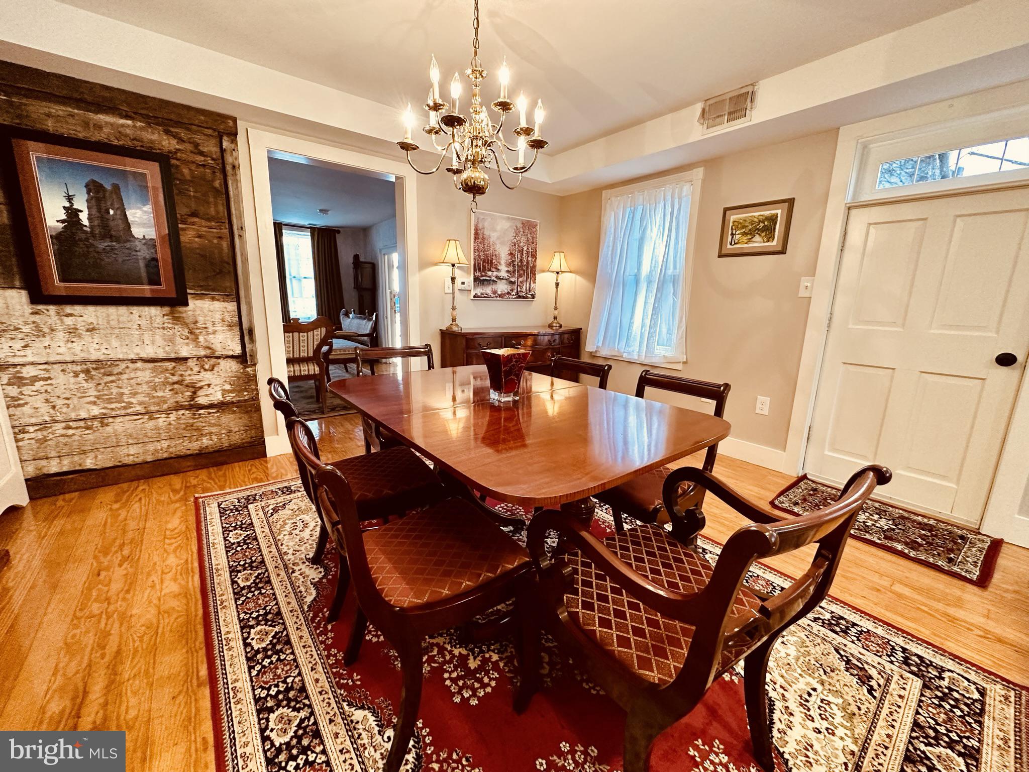 1627 Aliceanna Street Baltimore, MD 21231 - Photo 13 of 60 a dining room with furniture and window