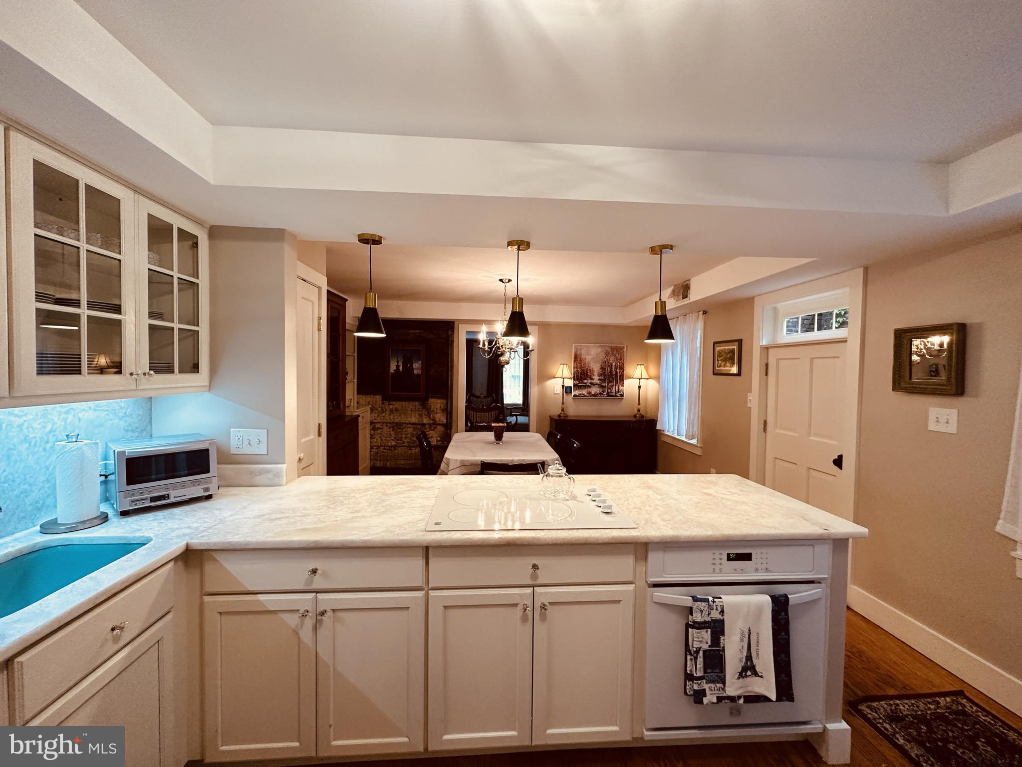 1627 Aliceanna Street Baltimore, MD 21231 - Photo 22 of 60 a view of kitchen with center island and stainless steel appliances