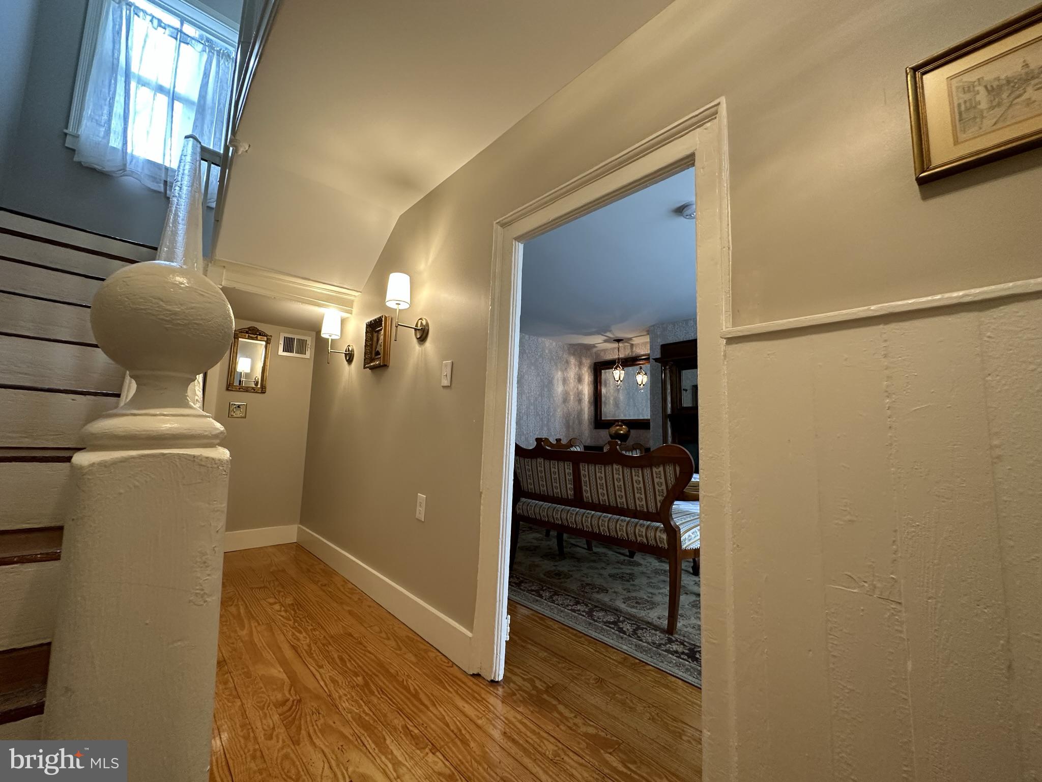 1627 Aliceanna Street Baltimore, MD 21231 - Photo 27 of 60 a view of hallway with livingroom and wooden floor