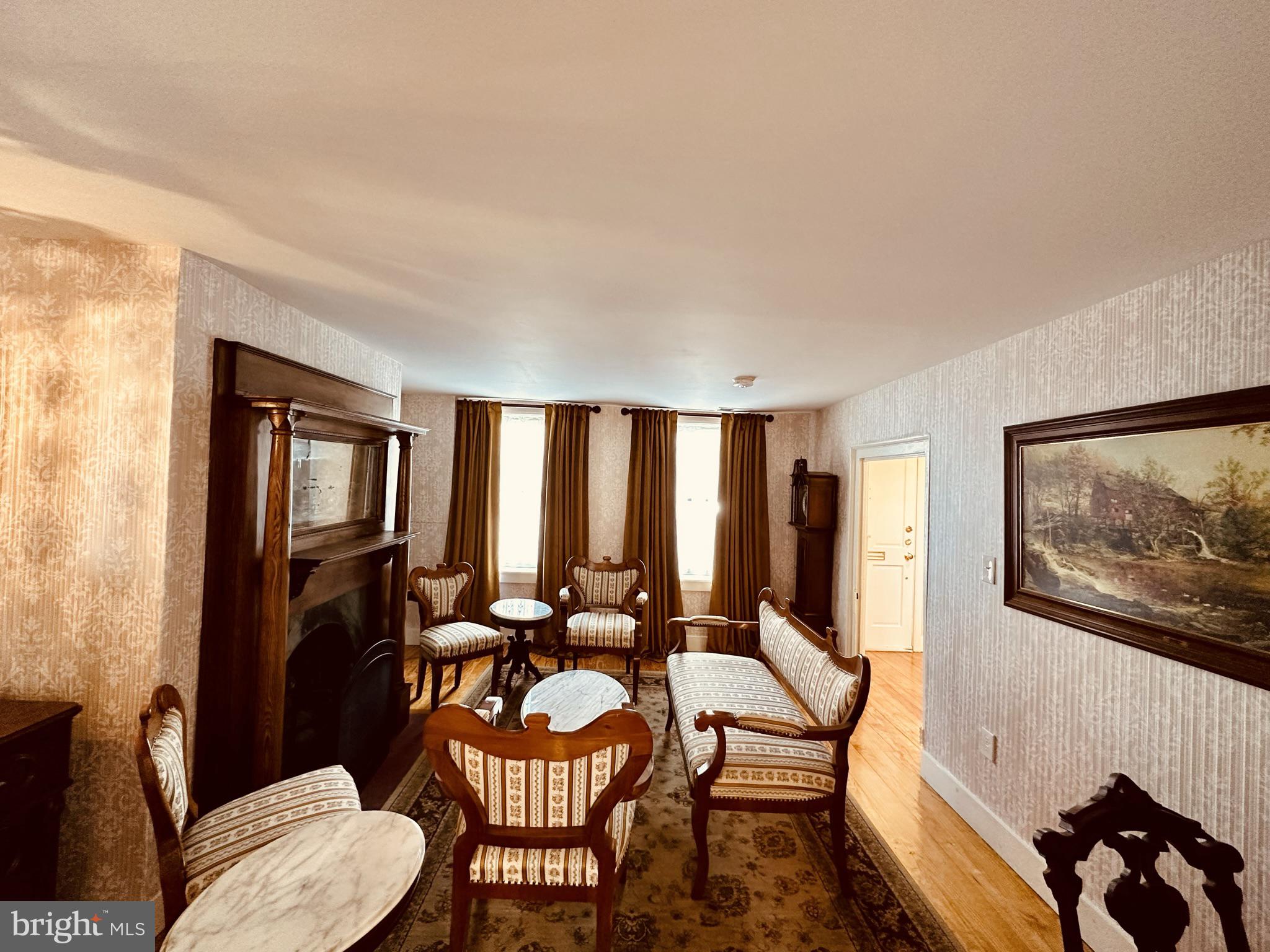 1627 Aliceanna Street Baltimore, MD 21231 - Photo 4 of 60 a view of a livingroom with furniture and window